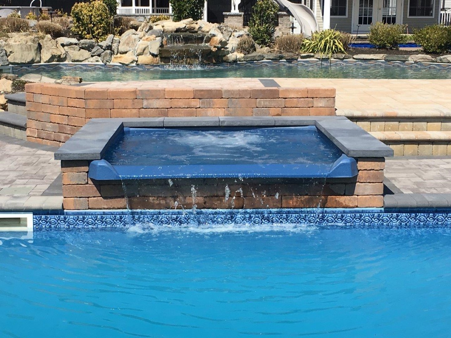 What Are Spillover Spas  Spillover Spas for Inground Pools